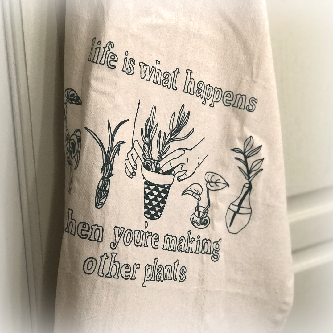 'Life is what happens...' Organic Cotton Tea Towel